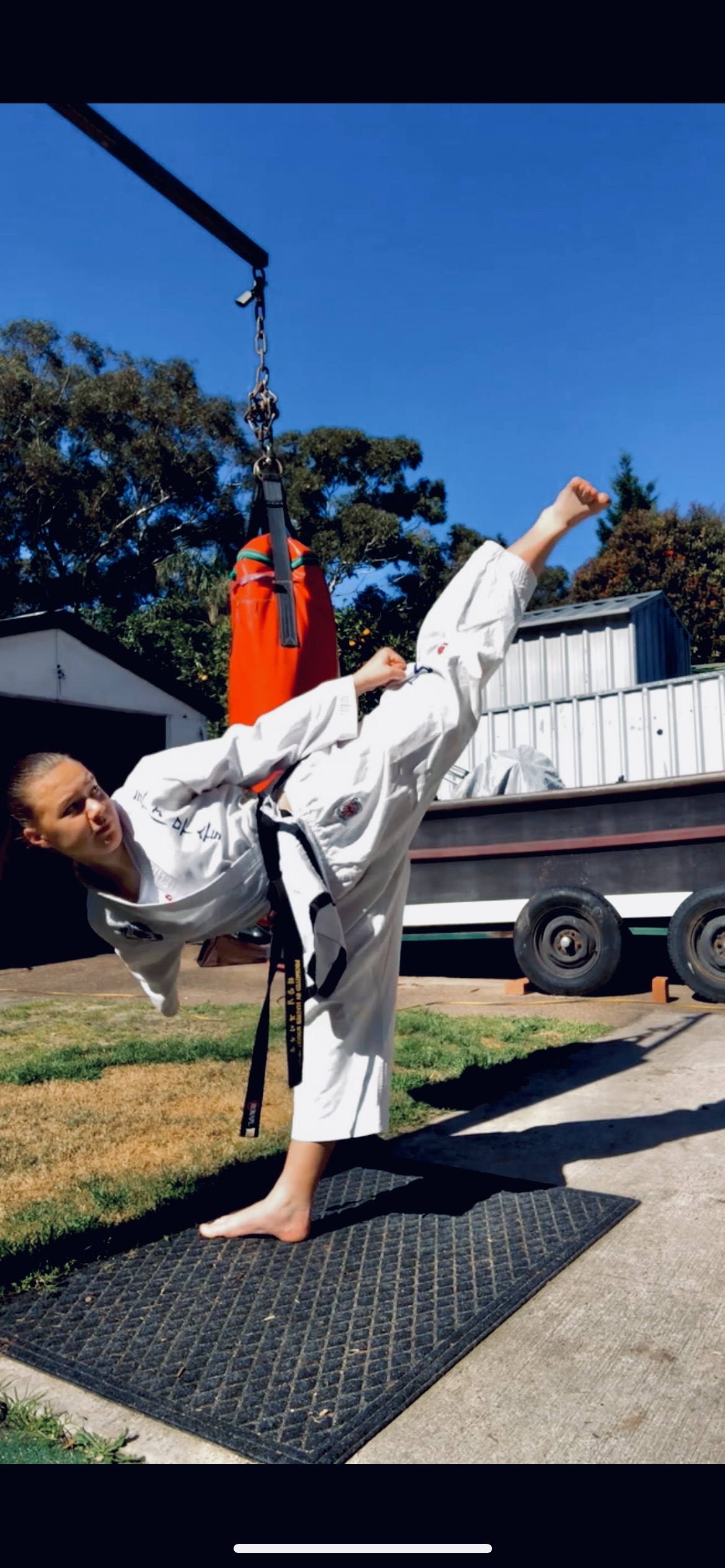 Jayme Zikman executing a high section Side Kick